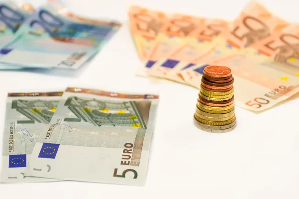 Banconote e monete in euro — Foto Stock