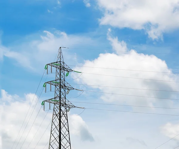 Electricity pylon n clouds — Stock Photo, Image