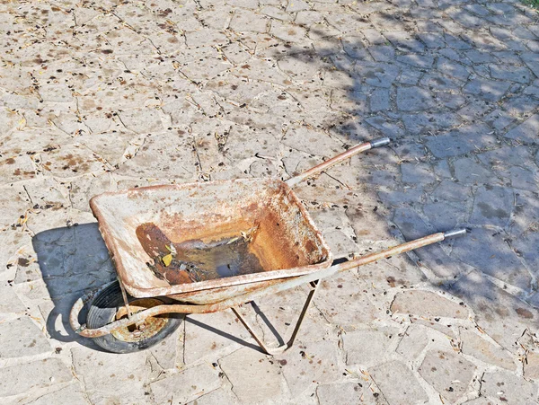 Wheelbarrow in the walkway — Stock Photo, Image