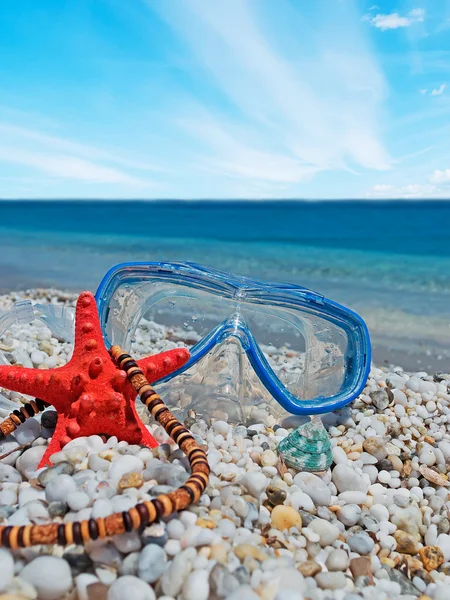 Collier, étoile de mer et masque — Photo