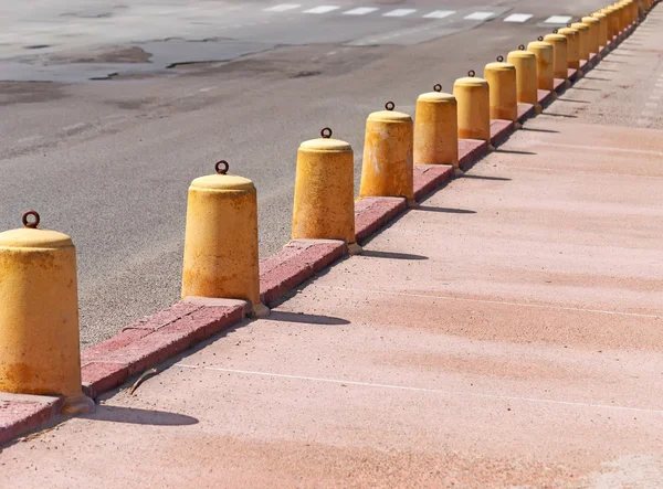 Yellow cement pylons — Stock Photo, Image