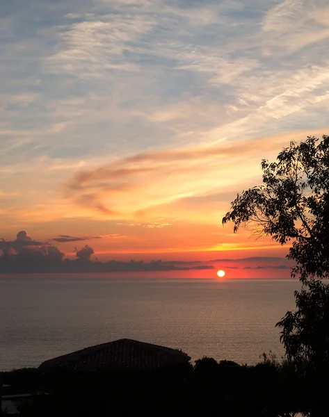 Sunset by the coast — Stock Photo, Image