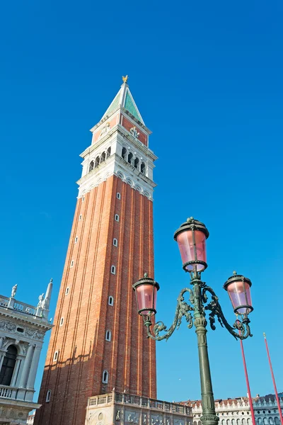 Bell tower and street lamp — Stock Photo, Image