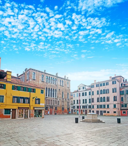 Old square and clouds — Stock Photo, Image