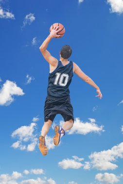 Left hand dunk among the clouds clipart