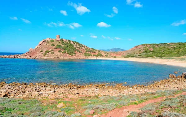 Rocks and sand in Porticciolo — Stock Photo, Image