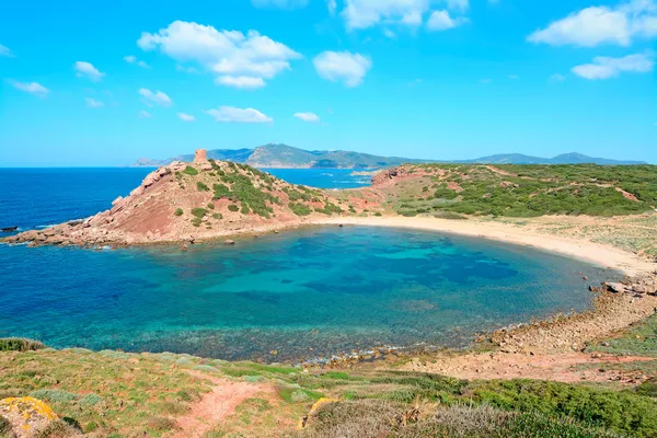 Mjuka moln över porticciolo beach — Stockfoto