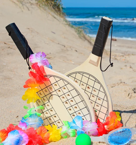 Rackets and necklace — Stock Photo, Image