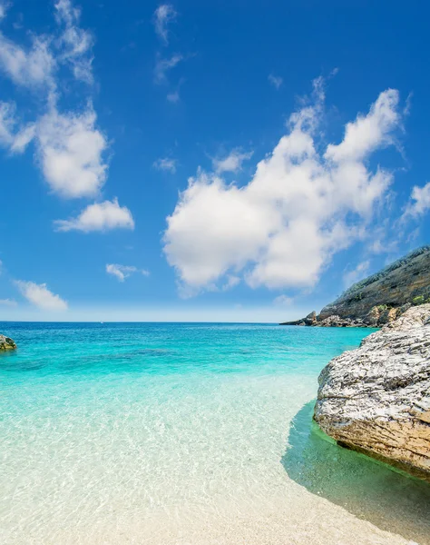 Paradise beach with clouds — Stock Photo, Image