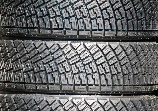 Pila de neumáticos nuevos — Foto de Stock