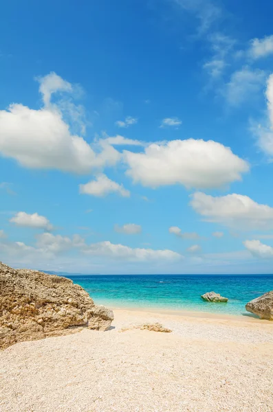 Fluffy clouds by the sea — Stock Photo, Image