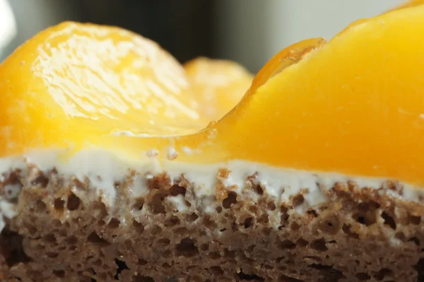 Chocolate biscuit with a peach — Stock Photo, Image