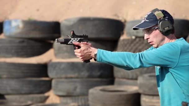 Shooting with gun — Stock Video