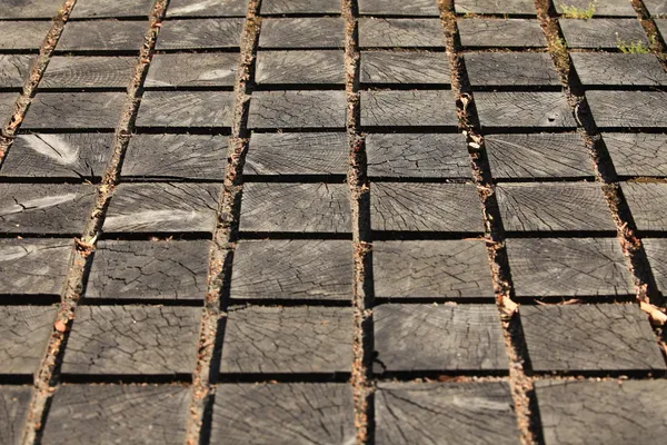 Cracked paving wooden walkway — Stock Photo, Image