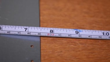 construction tape measure with a scale, length measurement close-up