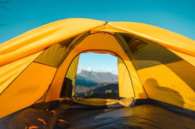 Yellow tent on the mountain and sunset view,Doi Luang