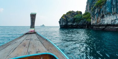 Travel on a long-tail boat in the sea in Krabi