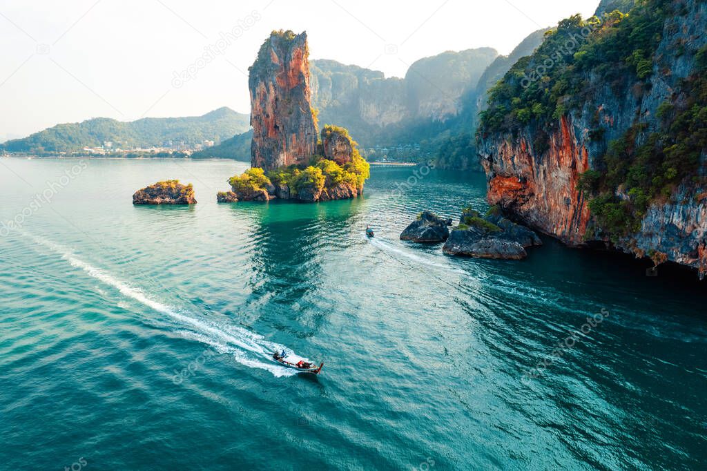 Sea views and rocky islands with a long-tail boat.form above in krabi 