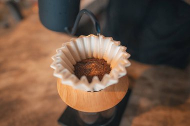 Closeup of hands barista make coffee,Drip coffee
