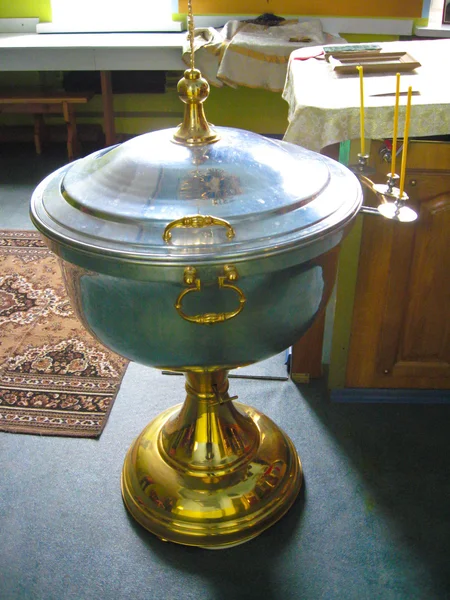 Religious place with metal tub — Stock Photo, Image