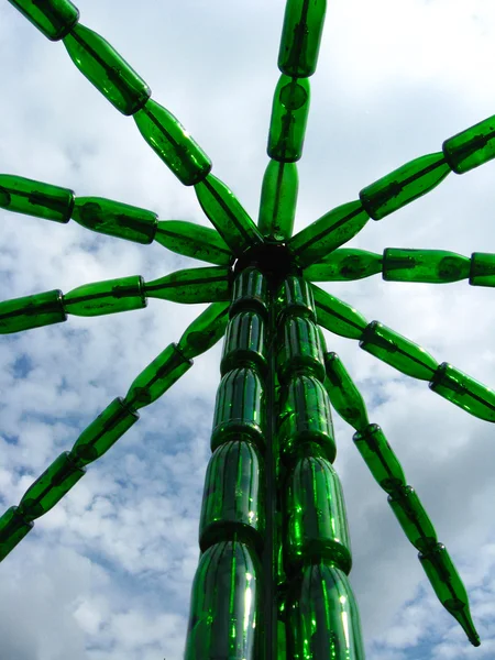 Palm tree made of bottles from a champagne — Stock Photo, Image