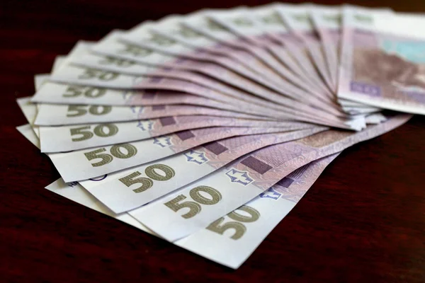 Pozadí ukrajinské peněžní hodnotě 50 grivnas — Stock fotografie