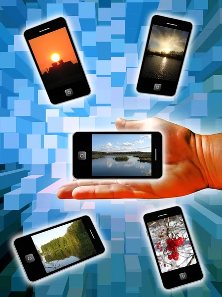 人間の手と近代的な携帯電話 — 图库照片