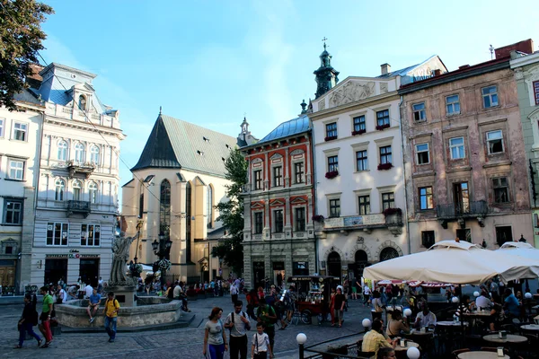 Square with monument of neptune in Lviv city — Stock Photo, Image