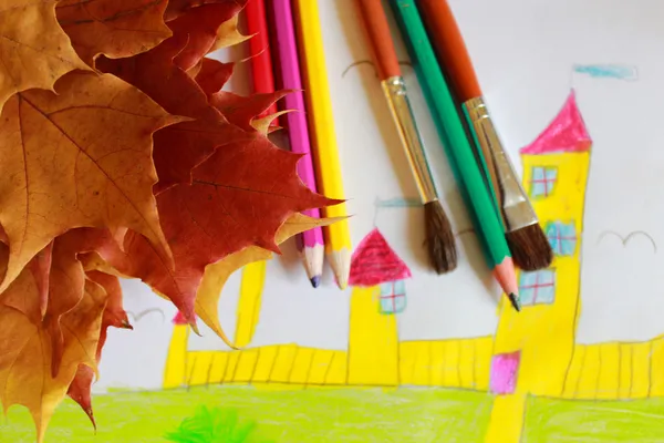 Children's drawing of house and autumn leaves — Stock Photo, Image