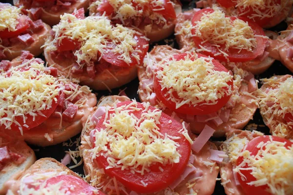 Hot sandwiches with sausage and melt cheese — Stock Photo, Image