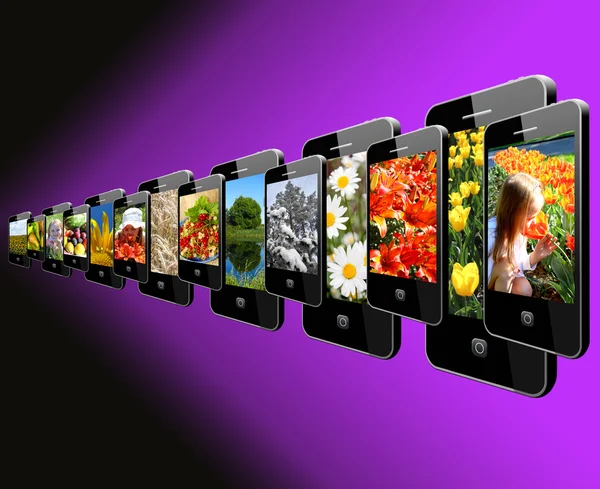 Modern mobile phones with different images — Stock Photo, Image