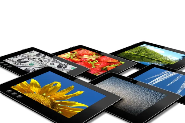 Algunas tabletas negras con imágenes variadas —  Fotos de Stock