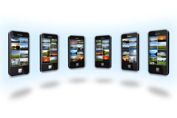 Modern mobile phones with different images — Stock Photo, Image