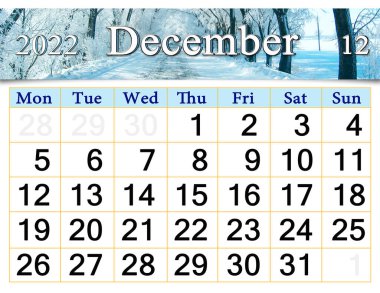 December 2022 Calendar for organizer to plan and reminder on nature background. calendar for December 2022 with ribbon of winter road and trees in hoar-frost. Monthly calendar