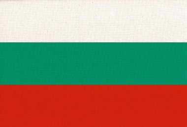 Bulgaristan bayrağı. Kumaş yüzeyinde Bulgar bayrağı. Dokulu arka planda Bulgar ulusal bayrağı. Kumaş dokusu. Bulgaristan Cumhuriyeti