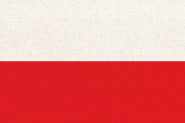 Polonya bayrağı. Kumaş yüzeyinde Polonya bayrağı. Dokulu arka planda Polonya ulusal bayrağı. Kumaş dokusu. Polonya Cumhuriyeti