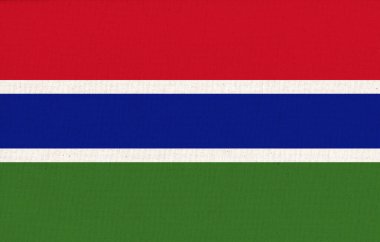 Gambiya bayrağı. Kumaş yüzeyinde ulusal Gambiya bayrağı. Dokulu arka planda Gambiya ulusal bayrağı. Kumaş dokusu. Gambiya Cumhuriyeti