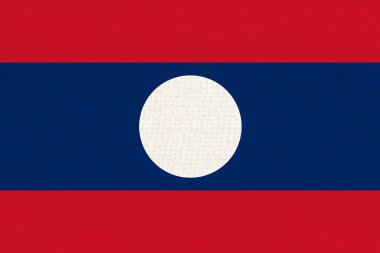 Laos bayrağı. Kumaş yüzeyinde Laos bayrağı. Kumaş dokusu. Lao Halkı Demokratik Cumhuriyeti. Lao durum sembolü