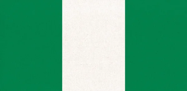 ナイジェリアの国旗 生地の表面にナイジェリアの国旗 生地の質感 国のシンボル ナイジェリア連邦共和国 — ストック写真