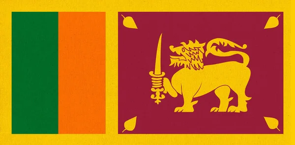 斯里兰卡的国旗 在织物表面悬挂斯里兰卡国旗 面料质地 锡兰在图案背景上的国家象征 斯里兰卡民主社会主义共和国 — 图库照片