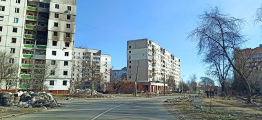 Chernihiv - Ukraine. 18 March 2022:consequences of artillery shelling on houses of peaceful city of Chernihiv in March 2022. multi-storey building in Chernihiv where rocket hit. Consequences of shelling of peaceful Ukrainian cities by Russian army