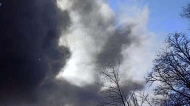 Smoke from fire in the city after an air strike by Russian aircraft on the city of Chernihiv. Horrors of war in Ukraine. Chernihiv is hero city. Fire during the war