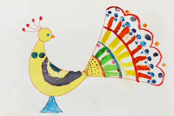 Children drawing of fabulous bird. Fire bird drawn by child. Peacock drawn with felt-tip pens. Beautiful peacock. childish art
