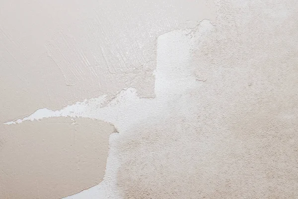 Gips Cement Texture Surface, Building and Construction Process.White Gips auf Zement Gips bemalte Wand. grau-beige Hintergrund. Ungleichmäßige Oberfläche der Steinstruktur. — Stockfoto
