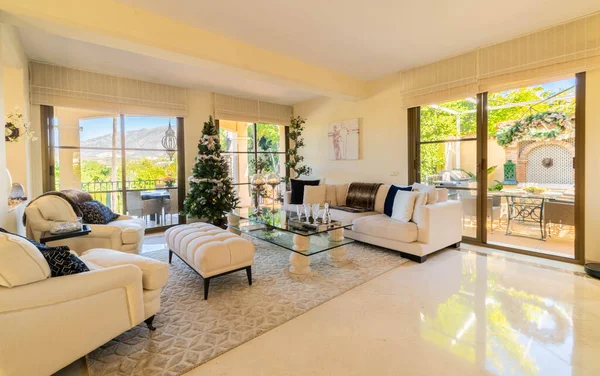 a view of the living room space inside a tropical villa along the costa del sol 