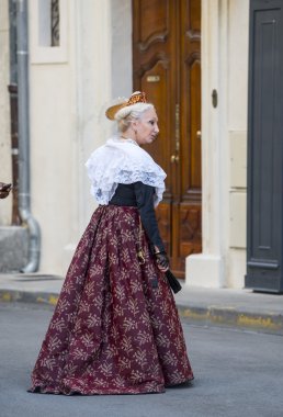 Arles, woman with traditional costume clipart