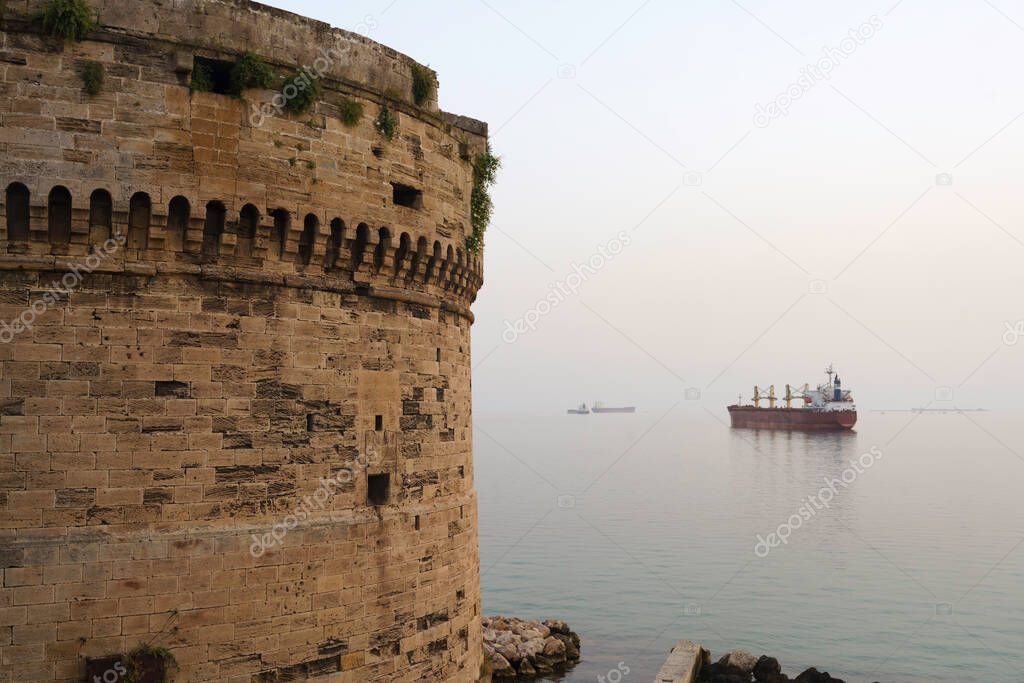 Taranto, Apulia, Italy: view of the castle on the sea at evening