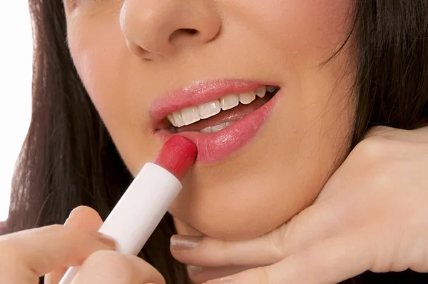 Vrouw en lippenstift — Stockfoto