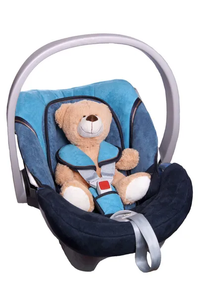 Teddy im Autositz — Stockfoto