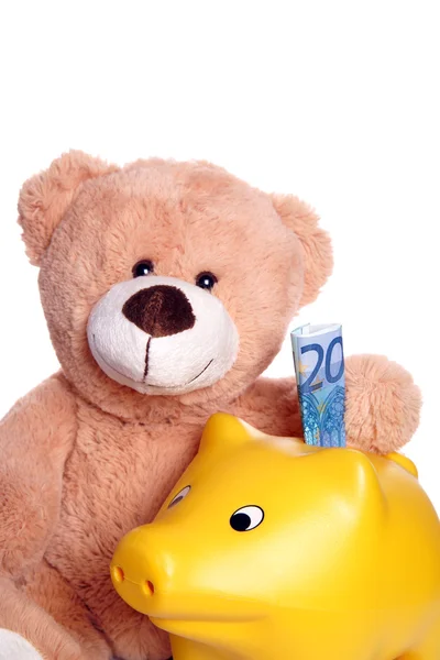 Teddy met piggy bank — Stockfoto